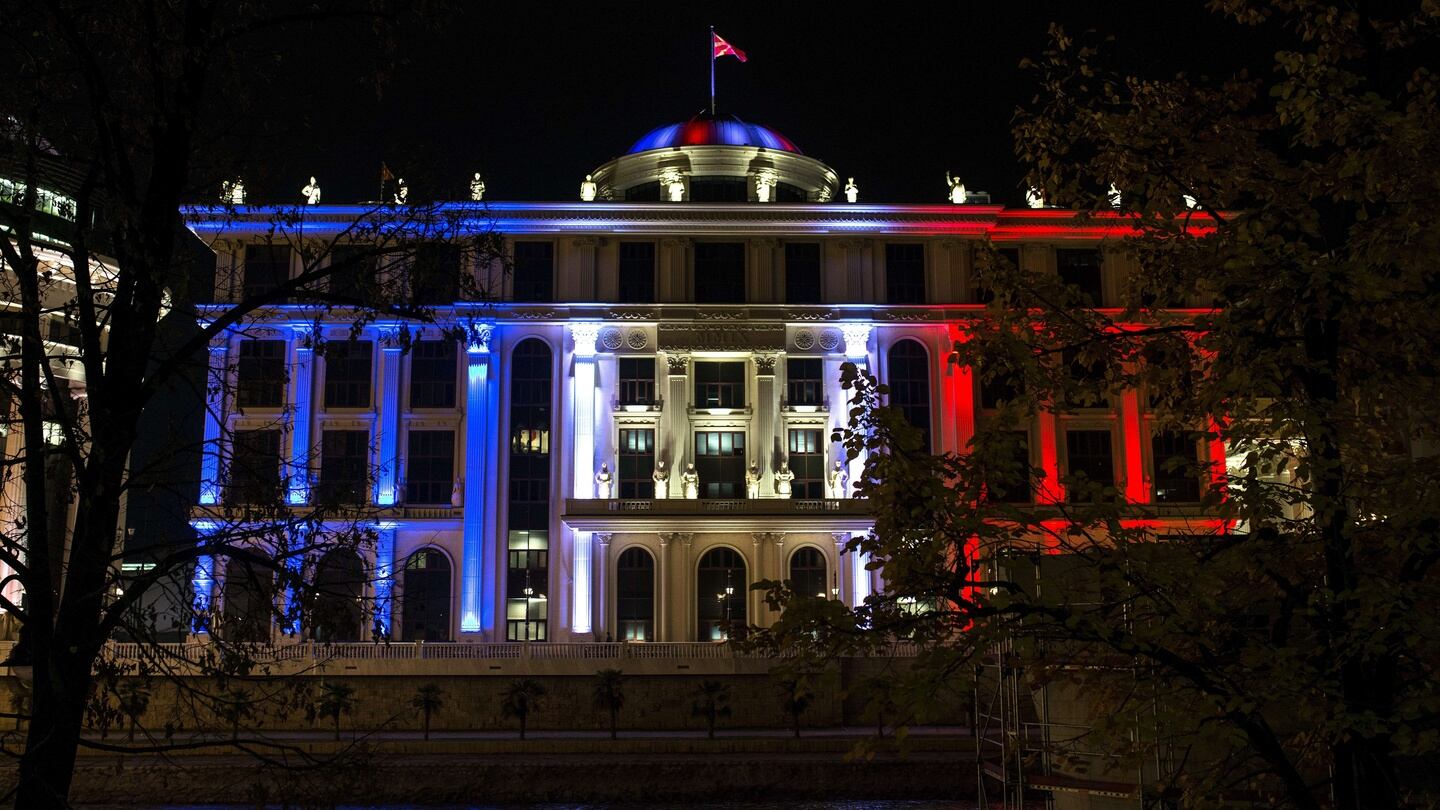 Macedonia’s Foreign Affairs Ministry is illuminated with the colours of the French national flag in Skopje on Saturday, in tribute to the victims of deadly attacks in Paris. Islamic State jihadists claimed a series of coordinated attacks by gunmen and suicide bombers in Paris that killed at least 129 people. Photograph: AFP