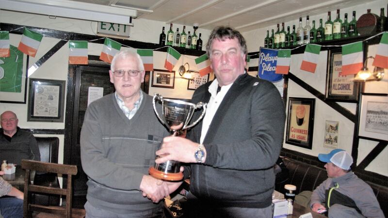 Basil Shields (right), winner of the charity competition at Knockaderry, with club treasurer Pat Smith