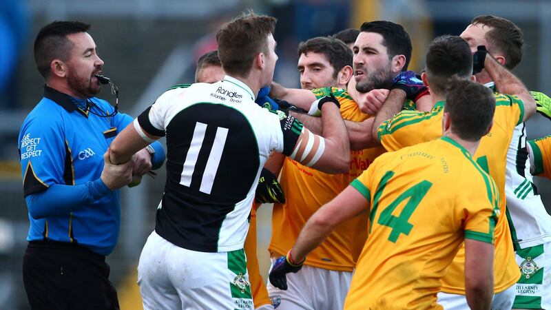 Referee Séamus Mulvihill tries to separate Kerry team-mates James O’Donoghue (Killarney Legion) and South Kerry’s Bryan Sheehan  after the 2015 final at Fitzgerald Stadium.  Photograph: Cathal Noonan/Inpho