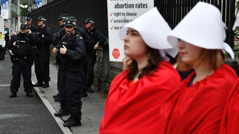 PSNI officers watch on as abortion rights campaign group Rosa hold a protest on Thursday in Belfast. Photograph: Charles McQuillan/Getty Images
