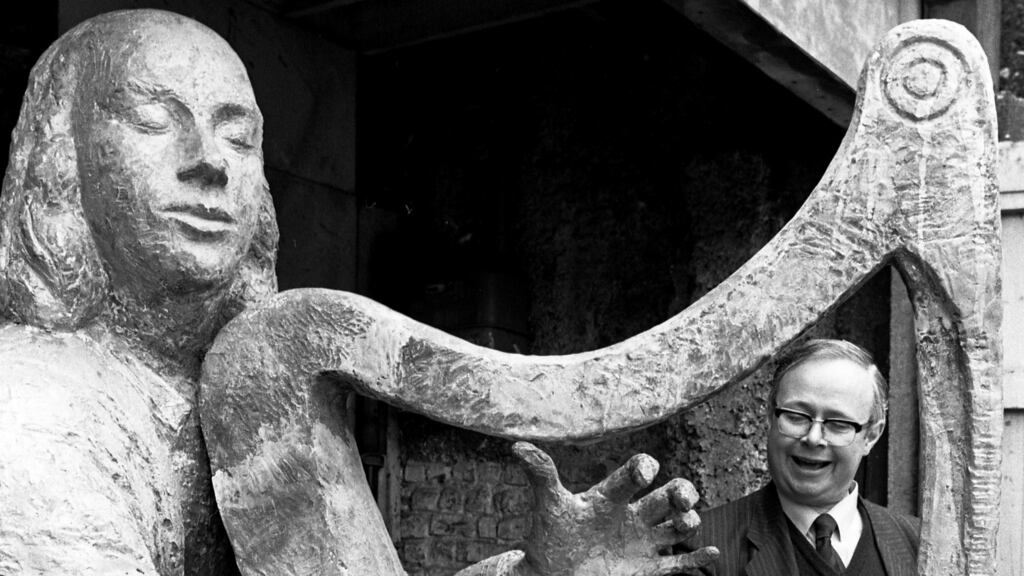 Derek Bell admires  Oisin Kelly’s memorial to Turlough Carolan, which was destined for Mohill, Co Leitrim. Photograph: Pat Langan