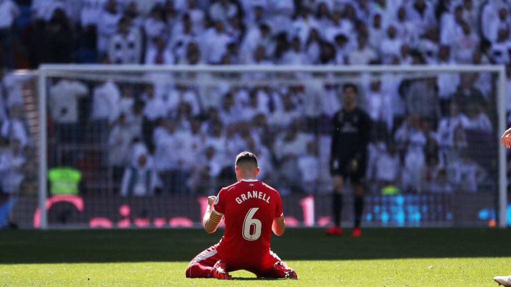 Girona’s Alex Granell celebrates after their La Liga victory over Real Madrid at the Bernabeu. Photo: Susana Vera/Reuters