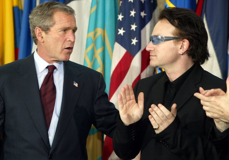 ‘Irish rock star with the Toxic Texan’: Bono with US president George W Bush in March 2002. Photograph: Alex Wong/AFP via Getty