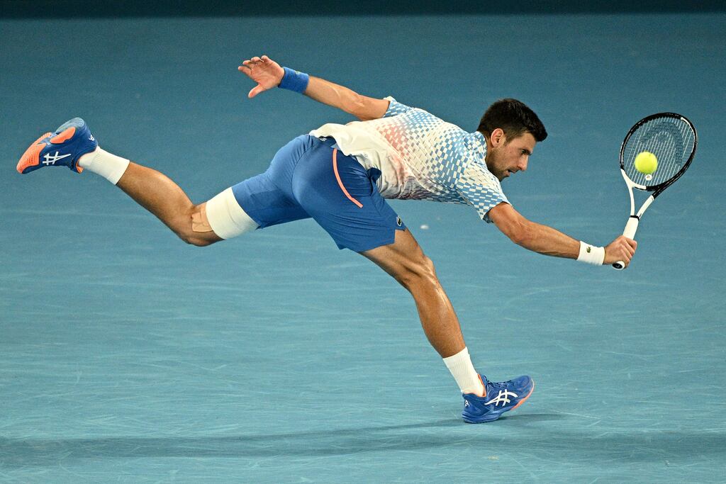 Serbia's Novak Djokovic hits a return against Australia's Alex De Minaur. Photograph: Anthony Wallace/AFP via Getty