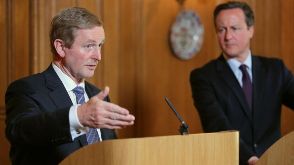 Taoiseach Enda Kenny (left) with British prime minister David Cameron during a press conference at 10 Downing Street in London. Mr Kenny expressed surprise and disappointment at the tone of the article written by the New York Times on the Berkeley tragedy that portrayed Irish students on J1 visas in the United States in a negative light. Photograph: Chris Radburn/PA Wire.