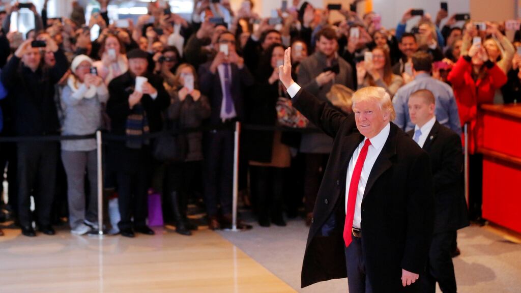 US president-elect Donald Trump in the lobby of the New York Times building after a question-and-answer session with journalists. Lucas Jackson/Reuters
