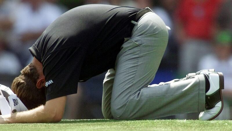 Westwood falls to his knees after missing a putt in the third round of the 1999 Masters. Photo: Roberto Schmidt/Getty Images