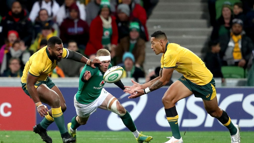 Ireland’s Keith Earls challenges for the ball with Australia’s Israel Folau and Marika Koroibete during the second Test at AAMI Park in Melbourne. Photograph: Dan Sheridan/Inpho