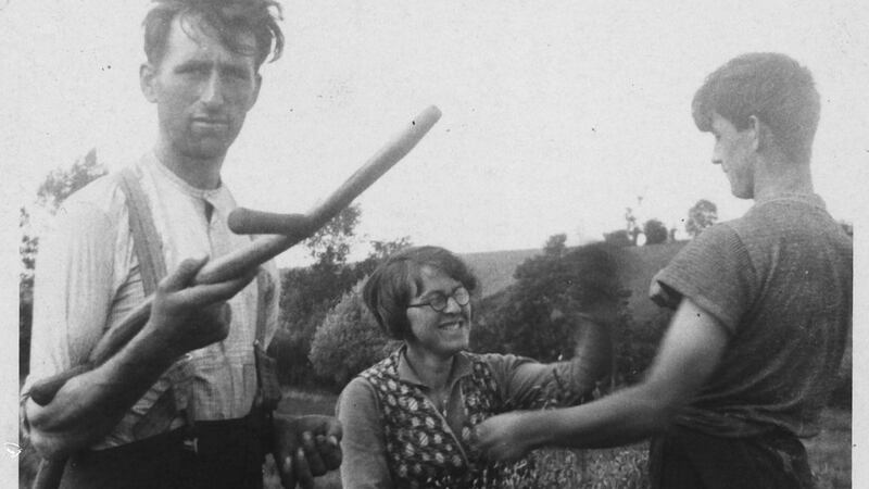 Patrick Kavanagh with his siblings Josie and Peter saving the hay in 1934