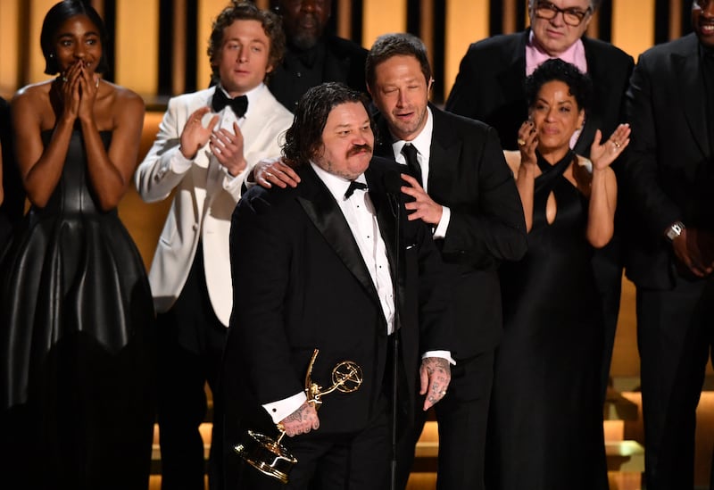Canadian chef and actor Matty Matheson (L) and US actor Ebon Moss-Bachrach speak as the cast and crew of The Bear accept the award for Outstanding Comedy Series during the 75th Emmy Awards. Photograph: Valerie Macon/AFP via Getty Images