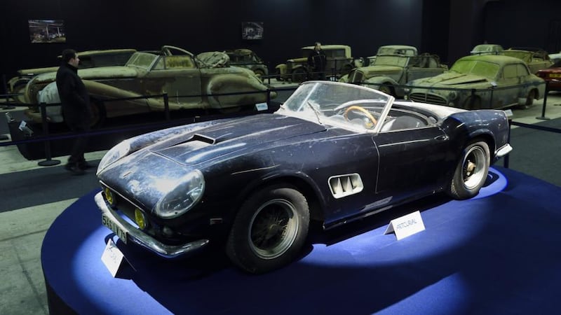 A collection of antique cars found in makeshift shelters at the Gaillard property in Echire, France, included a Ferrari 250 GT SWB California spider.