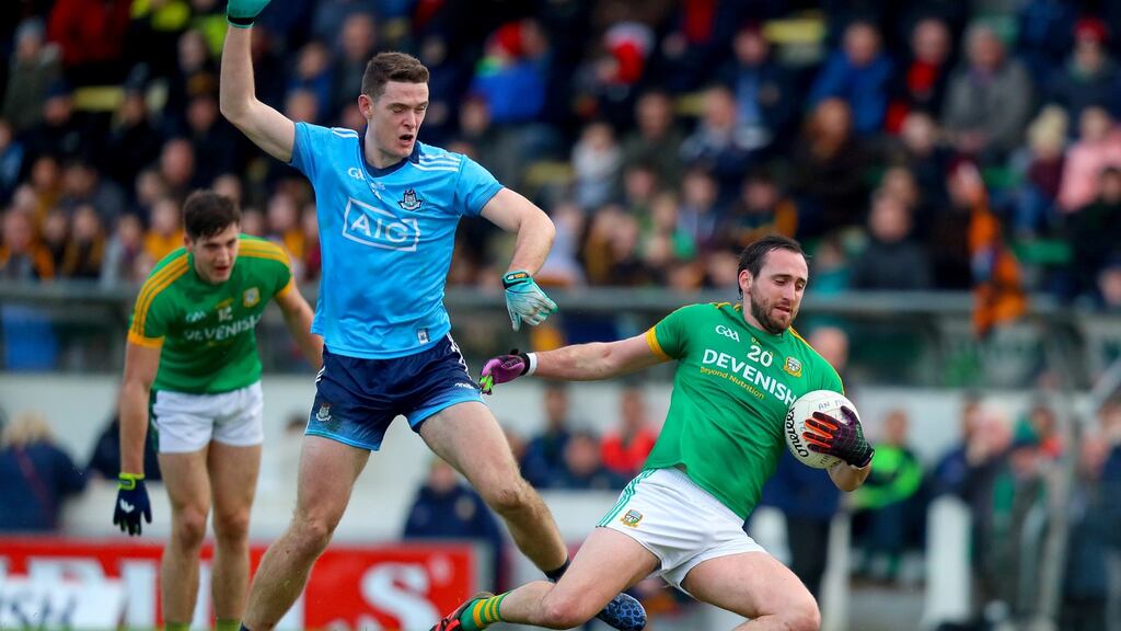 Dublin’s Brian Fenton challenges Graham Reilly of Meath. Photograph: Oisin Keniry/Inpho