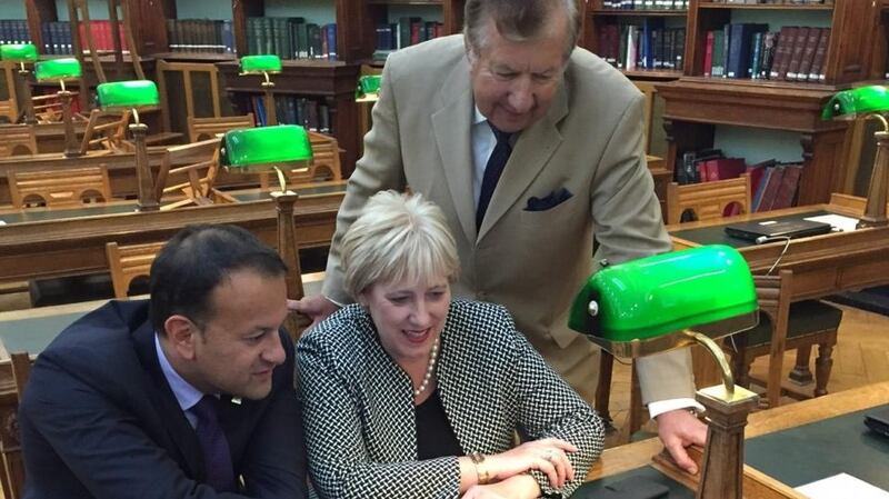 Tom Crean’s grandson Brendan O’Brien (right) with Minister for Social Protection Leo Varadkar and Minister for Arts and Heritage Heather Humphreys at the National Library of Ireland this week.