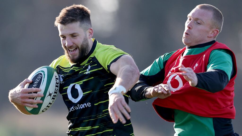 Stuart McCloskey and Keith Earls during Ireland’s training session at the  IRFU high-performance centre at Abbotstown. Photograph: Dan Sheridan/Inpho