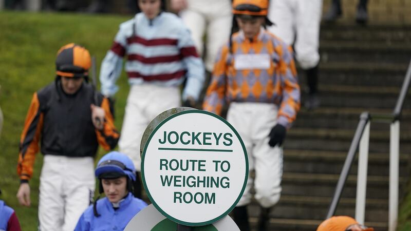 Jockeys leave the weighing room at Chepstow Racecourse. Photograph:  Alan Crowhurst/Getty