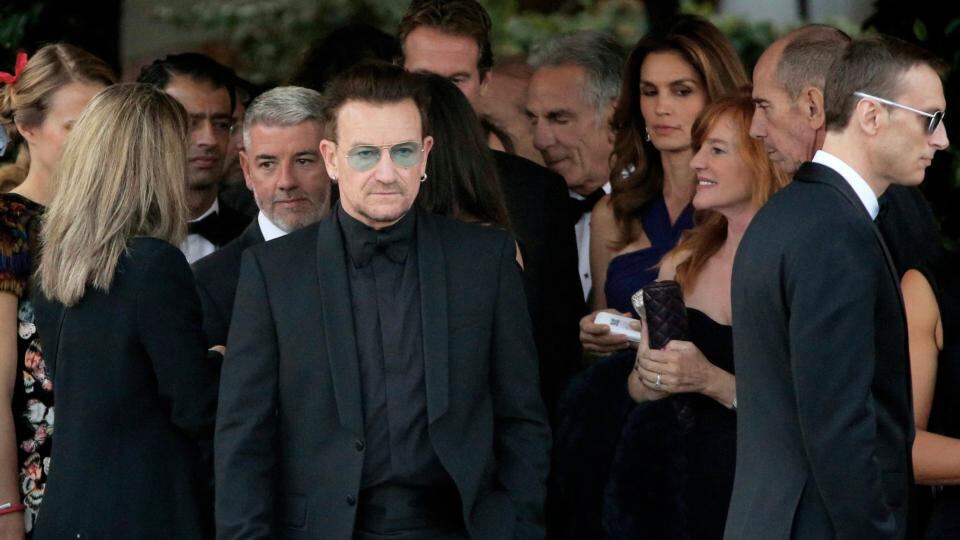 Bono arrives to board a taxi boat transporting guests to the venue of a gala dinner ahead of the official wedding ceremony of US actor George Clooney and his fiancee Amal Alamuddin in Venice yesterday. Photograph: Reuters