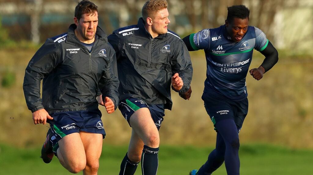 Craig Ronaldson, Steve Crosbie and Niyi Adeolokun during a Connacht training session at the Sportsground, Galway. Photograph: Inpho