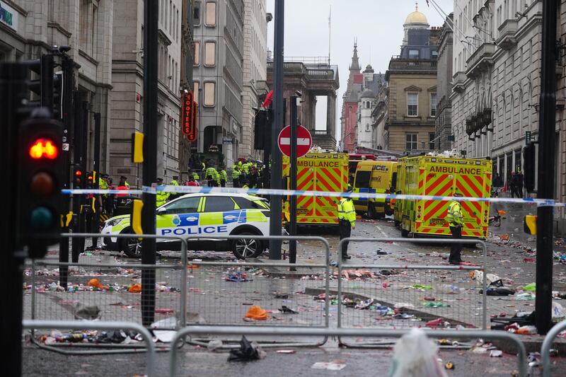 Police and emergency personnel dealing with an incident near the Liver Building in Liverpool during the Premier League winners parade. Photograph: Owen Humphreys/PA Wire