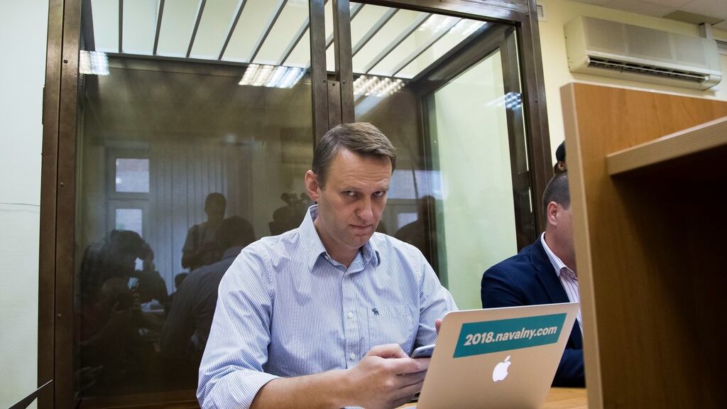 Russian opposition leader Alexei Navalny sits in a court room in Moscow on August 4th. Photograph: Ivan Sekretarev/AP