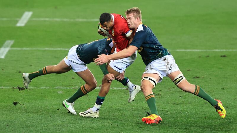 Lions wing Anthony Watson is tackled by South Africa A fullback Willie Le Roux (l) and Pieter-Steph du Toit during the match at Cape Town Stadium. Photograph: David Rogers/Getty Images