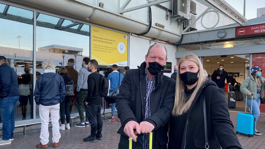 Paschal Roche  and his daughter Sarah Jane were among those who arrived at Dublin airport on Sunday  from London. Photograph: Jade Wilson