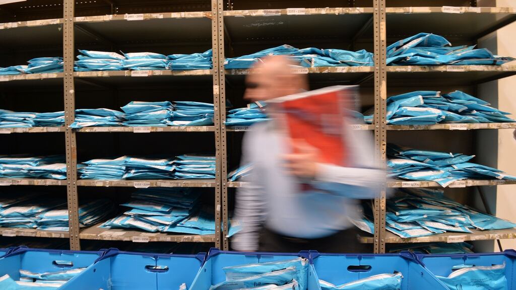 Sorting and despatching Leaving Cert exam scripts. An internal research report shows it is possible some exam candidates candidates are disadvantaged during the marking process. Photograph: Alan Betson