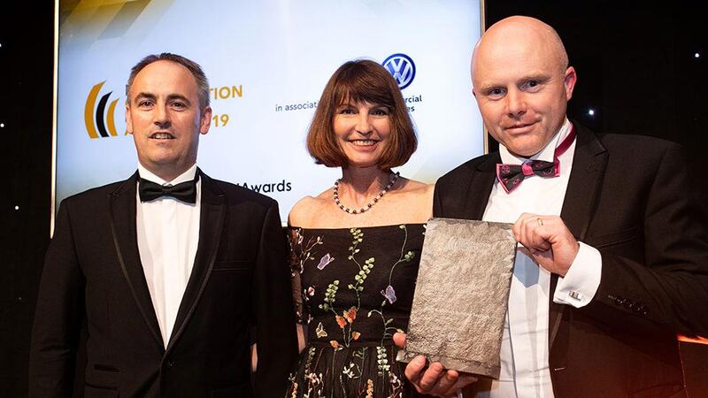 Carla Wentzel, Managing Director, Volkswagen Group Ireland presents the Sub-Contractor of the Year - Large award to Paul Dolan & Damian Glover.