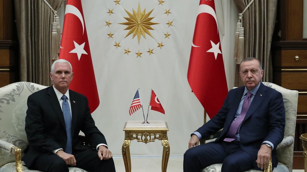 Turkish President Recep Tayyip Erdogan (R) and US Vice President Mike Pence (L) before their meeting in Ankara, Turkey. Photograph: EPA