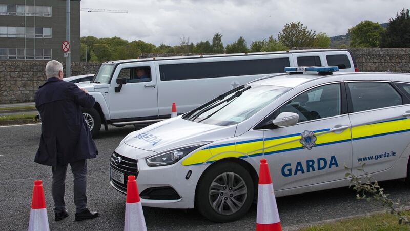 A limousine arrives as gardaí and contractors remove the wedding marquee at Burton Park, Leopardstown this afternoon. Photograph: Colin Keegan, Collins Dublin