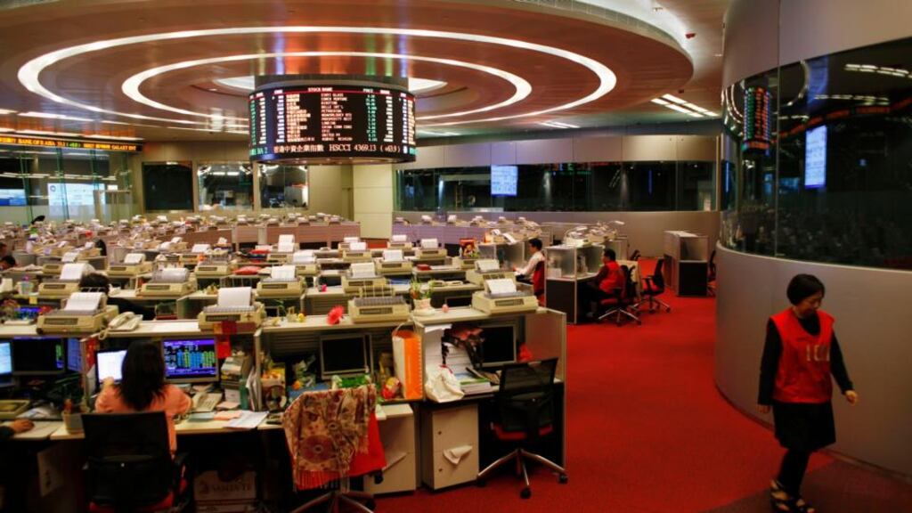 China’s securities regulator and its Hong Kong counterpart said on Thursday they would allow mainland investors to trade shares in designated companies listed in Hong Kong, while letting Hong Kong investors buy selected Shanghai-listed shares. Photograph: Bobby Yip/Reuters