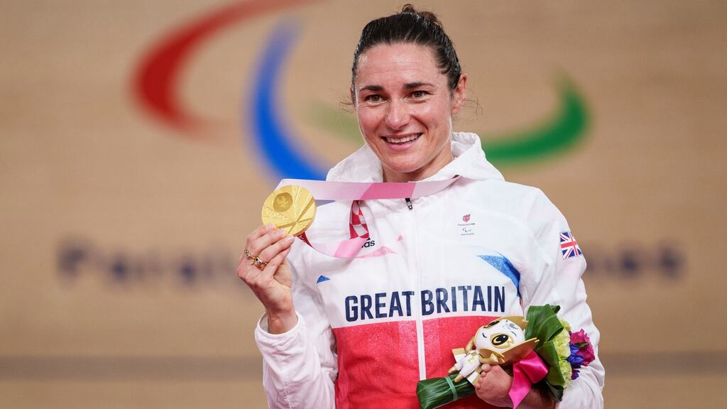 Sarah Storey celebrates with her 15 Paralympics gold medal. Photograph: Thomas Lovelock/PA
