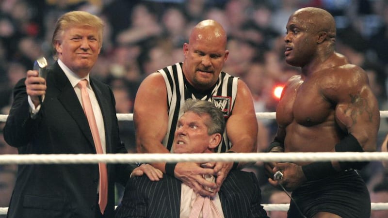 WWE chairman Vince McMahon prepares to have his head shaved by Donald Trump and Bobby Lashley while being held down by ‘’Stone Cold’’ Steve Austin after losing a bet in the Battle of the Billionaires at the 2007 WWE’s Wrestlemania at Ford Field in Detroit, Michigan. Photograph: Bill Pugliano/Getty