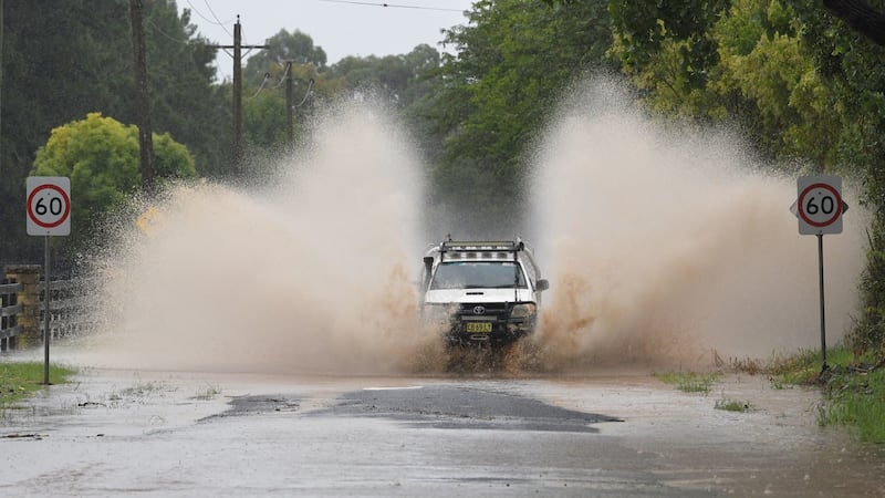 Road closure at Yarramundi Lane in Richmond, Australia, 20th March 2021. Photograph: Simon Bullard/EPA