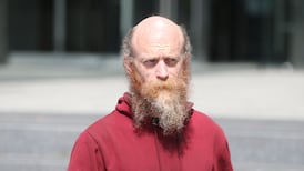 Activist accused of driving into anti-immigration protesters in Dublin wants to face trial before a jury