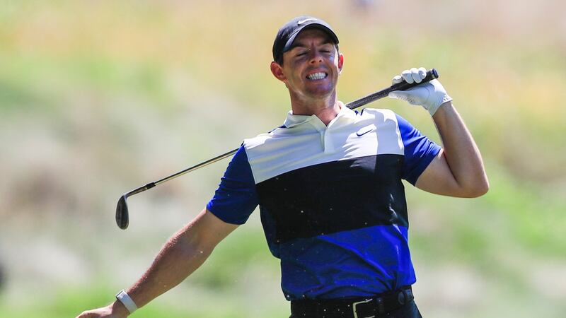 Rory McIlroy reacts to his fairway shot on the ninth hole during the first round of the World Golf Championships FedEx St Jude Invitational tournament at TPC Southwind in Memphis, Tennessee. Photograph: Tannen Maury/EPA