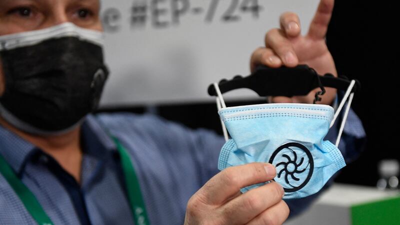 Eric Fouchard, president of NewPadMaker, demonstrates the aeronest mask ventilation kit during CES Unveiled ahead of the Consumer Electronics Show (CES) in Las Vegas, Nevada. Photograph: Patrick Fallon / AFP via Getty Images