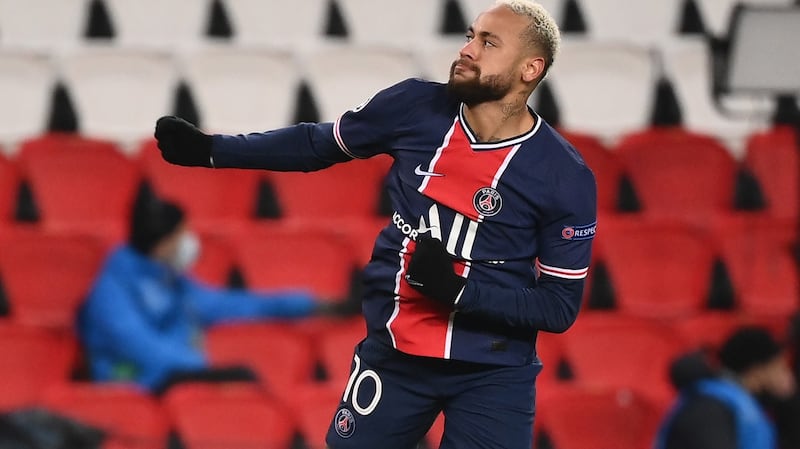Paris Saint-Germain forward Neymar celebrates after completing his hat-trick in the Champions League Group H match against Istanbul Basaksehir at the Parc des Princes. Photograph: Franck Fife/AFP via Getty Images