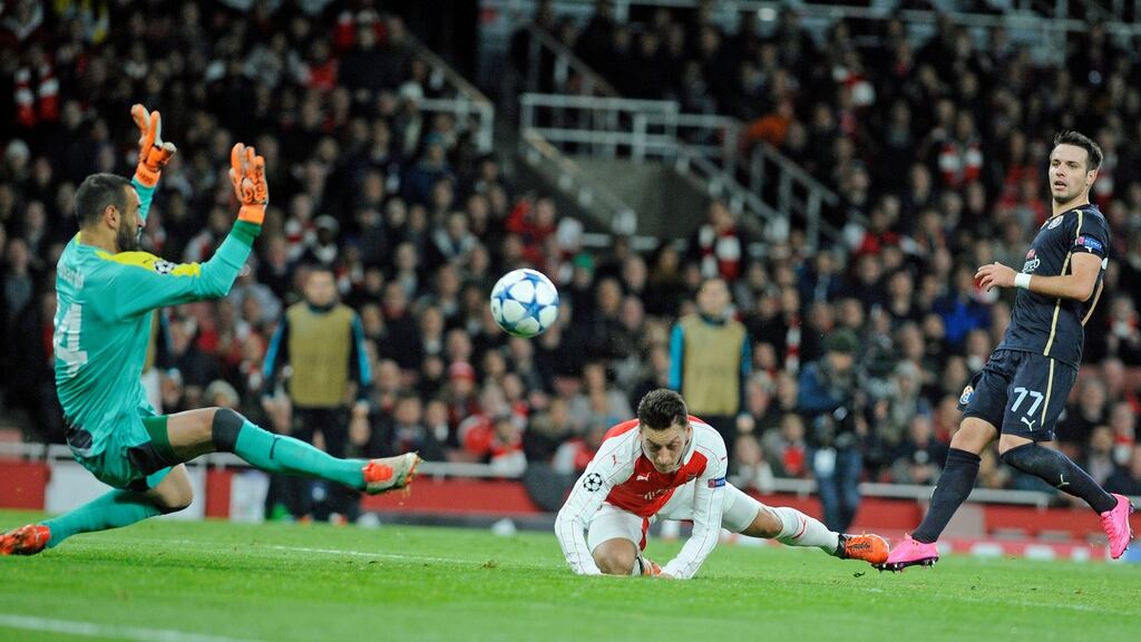 Mesut Özil opens the scoring for Arsenal in their Champions League Group F match against Dinamo Zagreb at the Emirates Stadium. Photograph: Gerry Penny/EPA