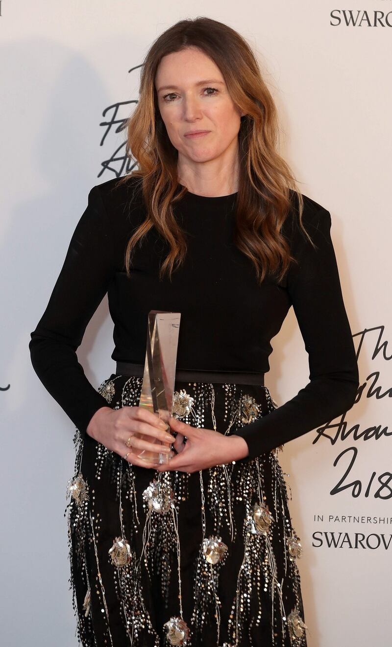 Givency’s British fashion designer Clare Waight Keller poses with her award for British womenswear designer of the yearWomenswear at the British Fashion Awards 2018 in London on Monday. Photograph: Daniel leal-Olivas/AFP/Getty Images