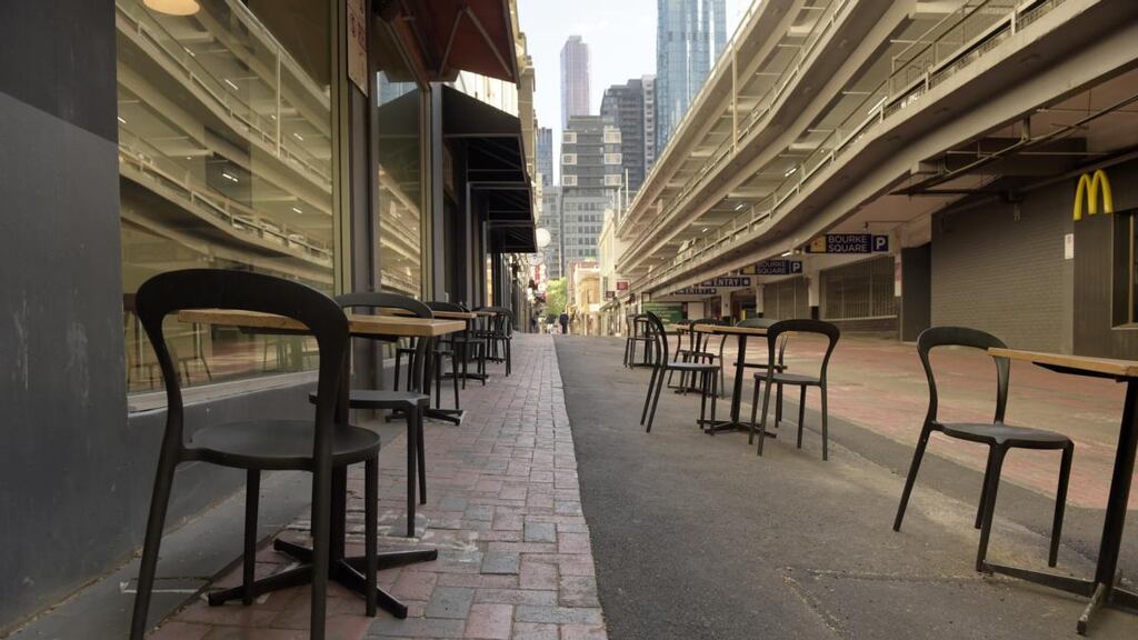 Cafe chairs and tables are set out on a lane in Melbourne on Wednesday as the city emerges from lockdown. Photograph: Carla Gottgens/Bloomberg