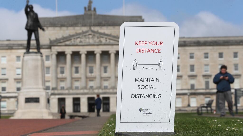 A social distancing sign in the Stormont Estate in Belfast. The North’s department of health has reported 1,471 new positive cases of Covid-19. Photograph: Brian Lawless/PA Wire