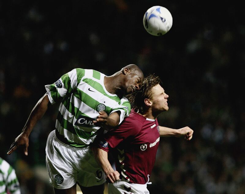 Celtic's Bobo Balde tackles Hearts' Edgaras Jankauskas during a Scottish Premier division match at Celtic Park in April 2006. Photograph: Jeff J Mitchell/Getty Images