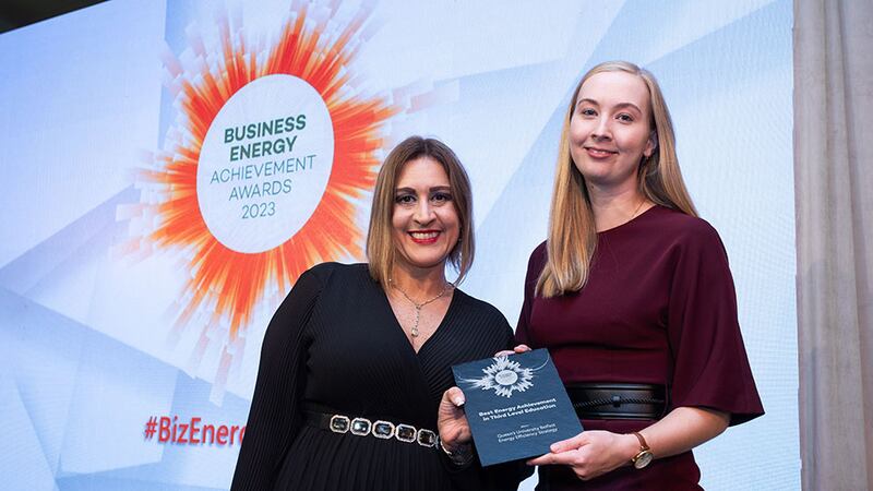 Katherine Valery, awards judge, presents the best energy achievement in third-level education award to Rachel Vaughan, Queen's University Belfast