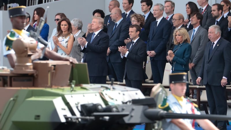 President Trump at the Bastille Day military parade on the Champs-Elysees avenue in Paris last July. According to reports, he enthused about the display of military pomp and ceremony on his way back to the US on Air Force One. Photograph: Getty Images
