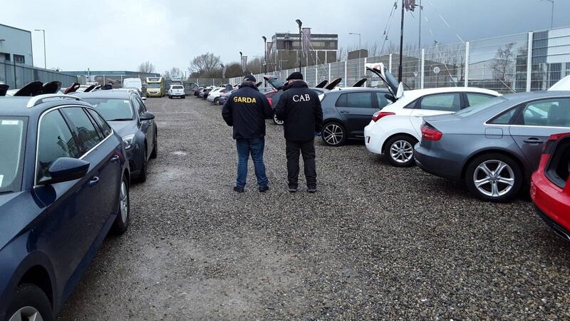 Officers at the scene of the raid.