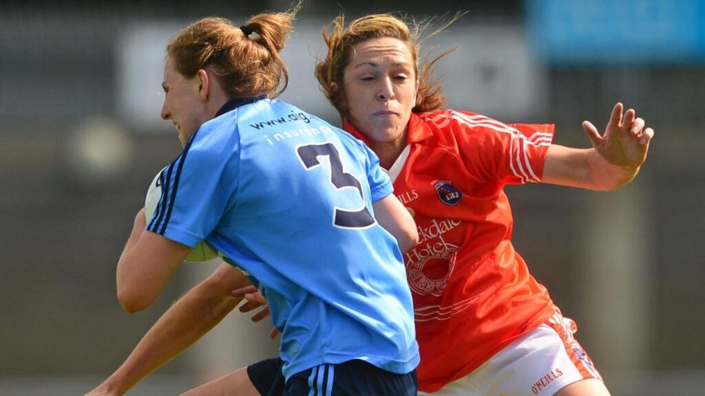 Muireann Ní Scanaill of Dublin in action against Armagh’s Caroline O’Hanlon during the TG4 Ladies Football All-Ireland Senior Championship semi-final at Parnell Park. Photograph: Piaras Ó Mídheach/Sportsfile