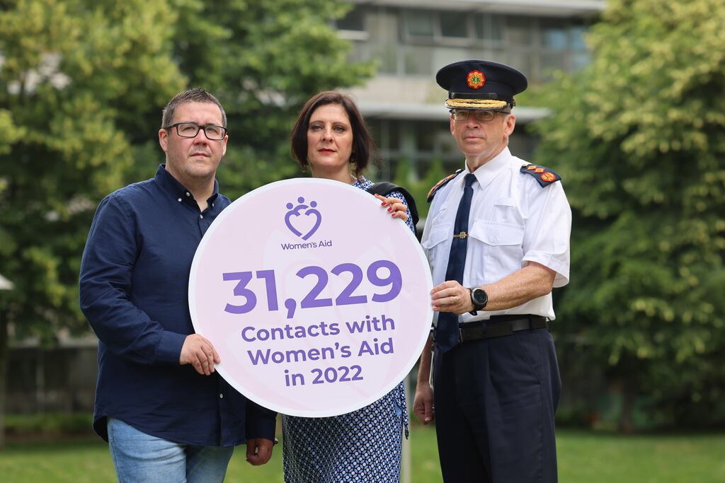 Sarah Benson, chief executive of Women's Aid, with Garda Commissioner Drew Harris (right) and Jason Poole, survivor advocate and brother of the late Jennifer Poole: 'We have introduced a new command control system called Garda Safe. That allows us a good deal more supervision of the calls,' says Mr Drew. Photograph: Dara Mac Dónaill