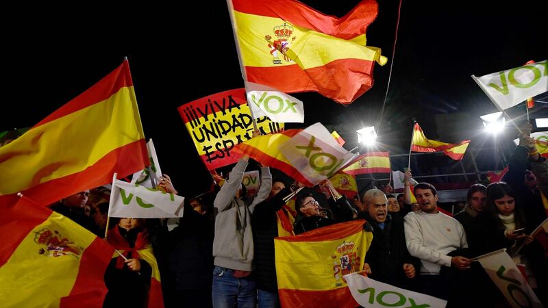 Supporters of Spanish far-right Vox party celebrate outside the party’s headquarters in Madrid on Sunday. Photograph: Oscar Del Pozo/AFP via Getty Images