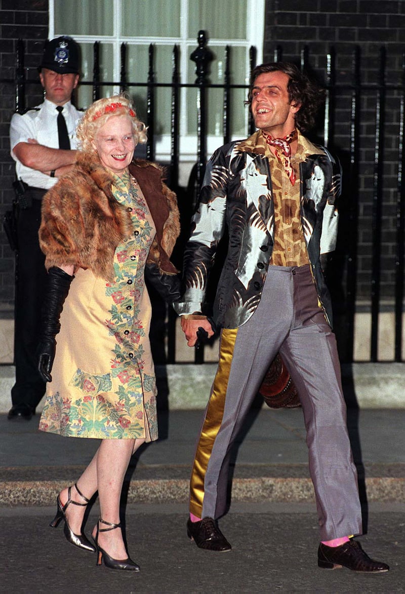 Vivienne Westwood with her husband Andreas Kronthaler arriving for a reception at 10 Downing Street, London, in 1997. Photograph: David Cheskin/PA
