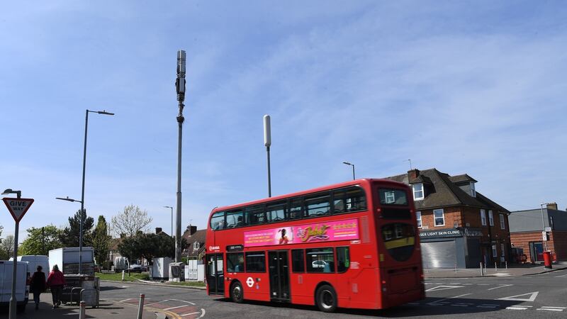 A burned down mobile phone mast in London, where authorities are increasingly concerned about the impact of conspiracy theories linking coronavirus to 5G networks. Photograph: Facundo Arrizabalaga/EPA